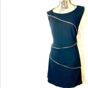 Adore black and white sheath dress with zippers.